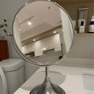 Double sided mirror- magnified on one side